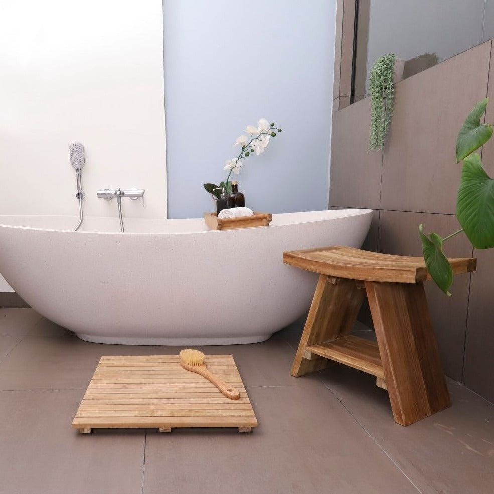 LifestyleImage_MainClaim_2_62eb1d80-f2bf-4ac2-8bf9-4e7cfe765ce5.jpg Siena Natural Teak Shower and Bath Stool with Curved Seat and Shelf - Image 1